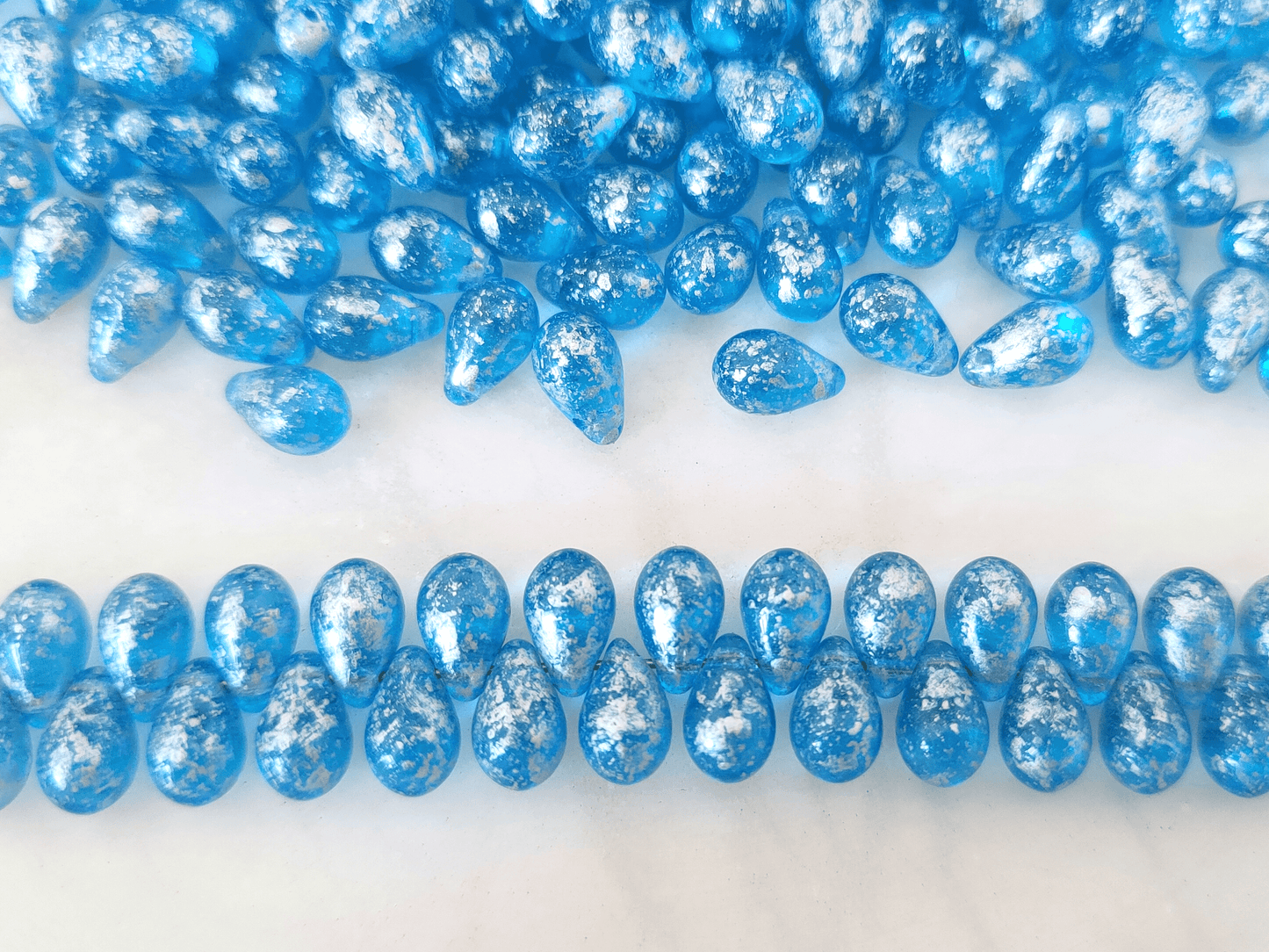 Tropfen 6x9mm - Blau & Silber gefleckt