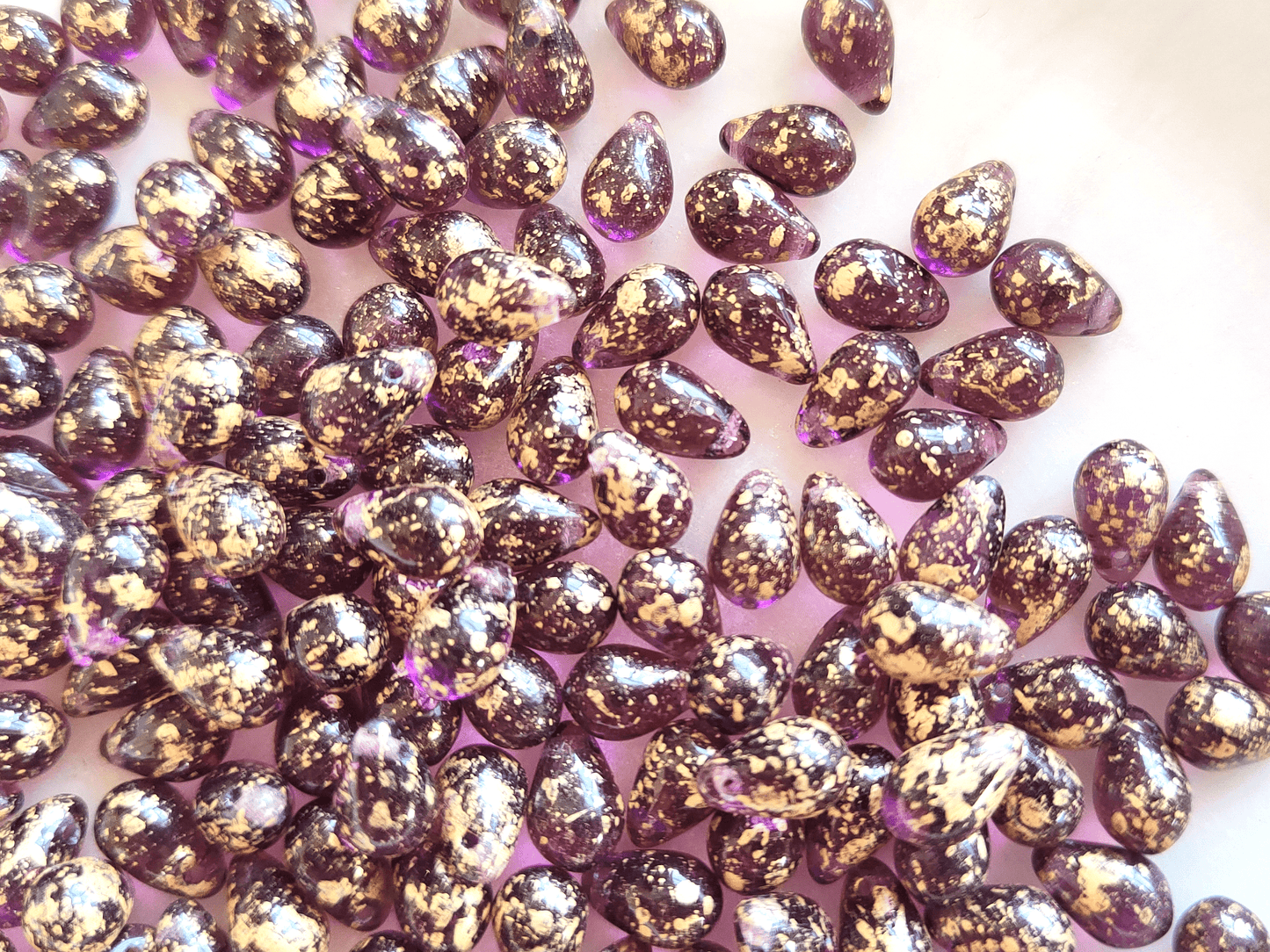 Drop beads 6x9mm - purple & golden speckles