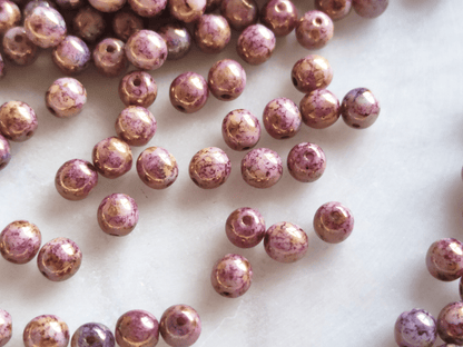 4mm round beads - purple marbled