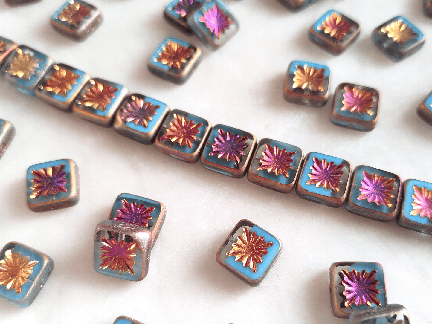 Quadratische Kiwi Ornamente 10mm - Hellblau Marea